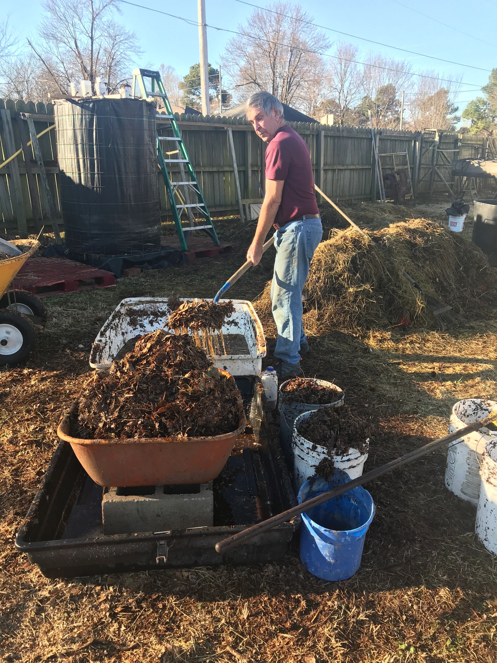 Working the compost bins